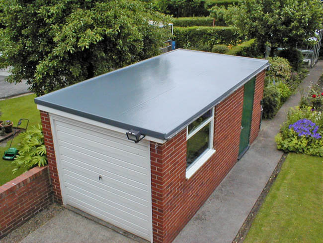 Remove Water From Your Flat Roofing System
