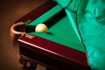 What should I consider when choosing a pool table cover?